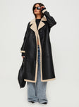 Longline coat Lapel collar, long sleeves, shearling cuffs & detail, single button fastening at cuff, twin hip pockets, double-breasted front 