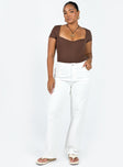 front view of model wearing Princess Polly Nolan Short Sleeve Bodysuit Brown Short Sleeves Scoop Neck 