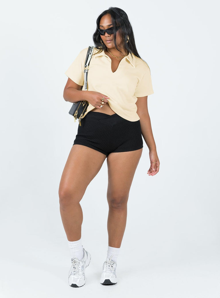 Front view of model wearing  front Princess Polly Short Sleeves Crew Neck  Box Avenue Polo Buttercream