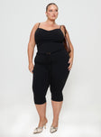 front view of model wearing Princess Polly Evanda Top Black Curve Sleeveless V-Neck 