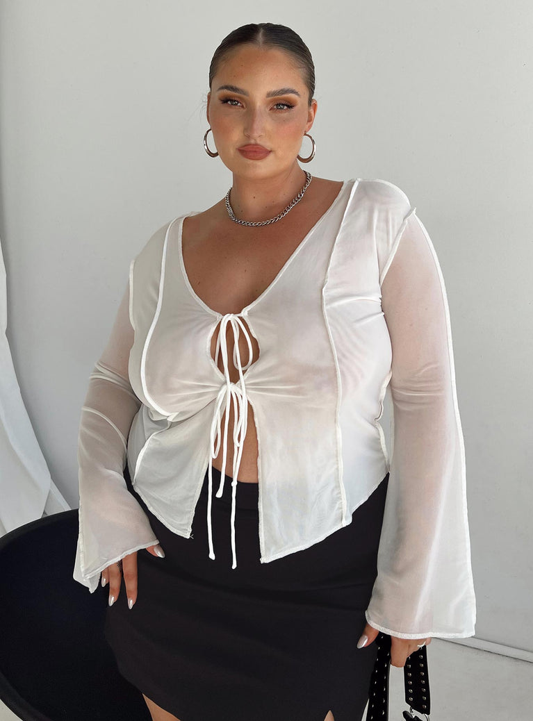 Front view of model wearing  front Princess Polly Full Sleeves Scoop Neck  Mereba Long Sleeve Top White Curve