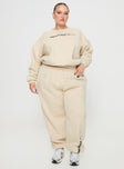 front view of model wearing Princess Polly Princess Polly Track Pants Block / Cursive Text Stone Curve High Waisted Pants 