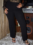 Front view of model wearing  front Princess Polly High Waisted Pants  Jeyne Yoga Pants Black Curve