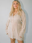 Front view of model wearing  front Princess Polly V-Neck  Forbidden Mini Dress Beige Curve