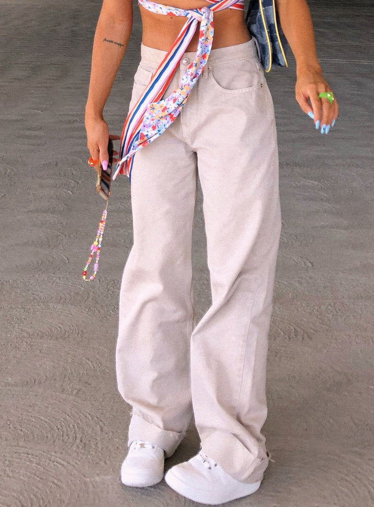 side view of model wearing Princess Polly Cheerful Denim Jeans Cream Mid Rise 