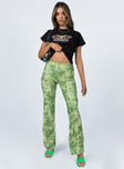 front view of model wearing Princess Polly Motel Heny Trouser Blurred Floral Green 