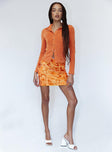   front view of model wearing Princess Polly Theordore Mini Skirt Orange 