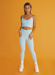 side view of model wearing Princess Polly Sports Star Leggings Blue 