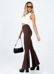 side view of model wearing Princess Polly Rita Roberts Flares Brown 