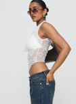 side view of model wearing Princess Polly Maryam Lace Top White Sleeveless Cowl 