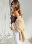 side view of model wearing Princess Polly Lester Knit Cardigan Cream Long 