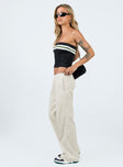 Front view of model wearing  front Princess Polly High Waisted Pants  Kent Parachute Pants Beige