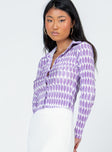 side view of model wearing Princess Polly Elody Long Sleeve Top Purple Multi 