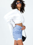   side view of model wearing Princess Polly Giannia Denim Mini Skirt Mini Skirts 