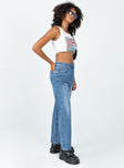 side view of model wearing Princess Polly Taxco Straight Leg Denim Jeans Mid Rise 