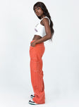 side view of model wearing Princess Polly Miami Vice Pants Red Mid Rise 