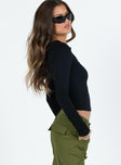 side view of model wearing Princess Polly Elements Long Sleeve Top Black Full Sleeves Crew Neck 