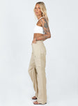 side view of model wearing Princess Polly Miami Vice Pants Wheat Low Rise Jeans 