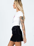   side view of model wearing Princess Polly Aswan Constrast Stitch Mini Skirt Black 