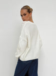 back view of model wearing Princess Polly Canlish Cable Sweater Cream 