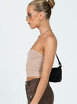 side view of model wearing Princess Polly Alima Strapless Top Beige 