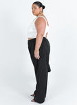 Front view of model wearing  front Princess Polly High Waisted Pants High Waisted Pants High Waisted Pants  Archer Pants Pinstripe Black Curve