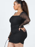 side view of model wearing Princess Polly Charvi Long Sleeve Mini Dress Black Curve 