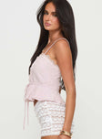 side view of model wearing Princess Polly Kruik Top Pink Sleeveless Square Neck 