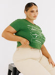 side view of model wearing Princess Polly Organic Protect Charity Baby Tee Green Curve Short Sleeves Crew Neck 