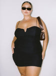 side view of model wearing Princess Polly I Want You Mini Dress Black Curve Sweetheart Neckline 