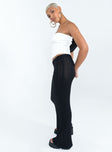   side view of model wearing Princess Polly Belle Knit Maxi Skirt Black Maxi 