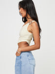 One shoulder crop top Textured material, one shoulder design, silver-toned ring, asymmetric hem Good stretch, fully lined 