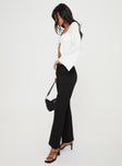 High rise pants Thick waistband, invisible zip fastening, straight leg Non-stretch material, unlined 