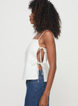 side view of model wearing Princess Polly Novalie Top White Sleeveless Square Neck 