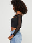 Front view of model wearing  front Princess Polly Sleeveless High Neck  Kampton Off The Shoulder Top Black