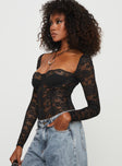 side view of model wearing Princess Polly Cadrot Long Sleeve Lace Bodysuit Black Full Sleeves 