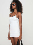 side view of model wearing Princess Polly Evaner Mini Dress White Scoop Neck 