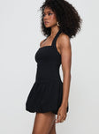 side view of model wearing Princess Polly Gigli Bubble Hem Mini Dress Black Tall Square Neck 