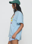 side view of model wearing Princess Polly Grocery Run Oversized Graphic Tee Blue Half Sleeves Crew Neck 