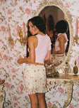 back view of model wearing Princess Polly Bouket Mini Skirt Cream Floral Mini Skirts 