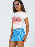   side view of model wearing Princess Polly Forbidden Mini Skirt Blue 