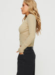 side view of model wearing Princess Polly Lathan Long Sleeve Rib Top Beige Full Sleeves High Neck 