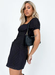 side view of model wearing Princess Polly Fauci Mini Dress Black Square Neck 