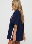 side view of model wearing Princess Polly Goal France Oversized Tee Blue Half Sleeves Crew Neck 