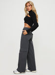 side view of model wearing Princess Polly Luna Mid Rise Cargo Pants Charcoal Mid Rise 