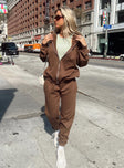 Front view of model wearing  front Princess Polly  Renna Track Pants Brown