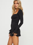 side view of model wearing Princess Polly Dalzine Long Sleeve Mini Dress Black Petite Sweetheart Neckline 