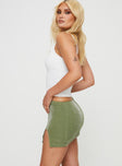 Front view of model wearing  front Beller Low Rise Mini Skirt Green Princess Polly  Mini Skirts 