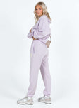 Front view of model wearing  front Princess Polly  Princess Polly Track Pants Squiggle Text Dusty Mauve / Eggshell