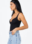 side view of model wearing Princess Polly Wilana Bodysuit Black Sleeveless Sweetheart 